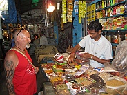 Peter buys spices on the market in Margao